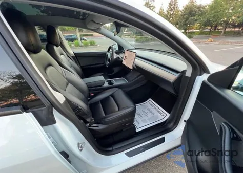 2022 Tesla Model Y из США, поврежденный, VIN 7SAYGDEF6NF343071